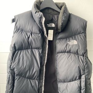 North Face Puffer Vest: Tag has been cut. Medium. Gently worn, pet free house